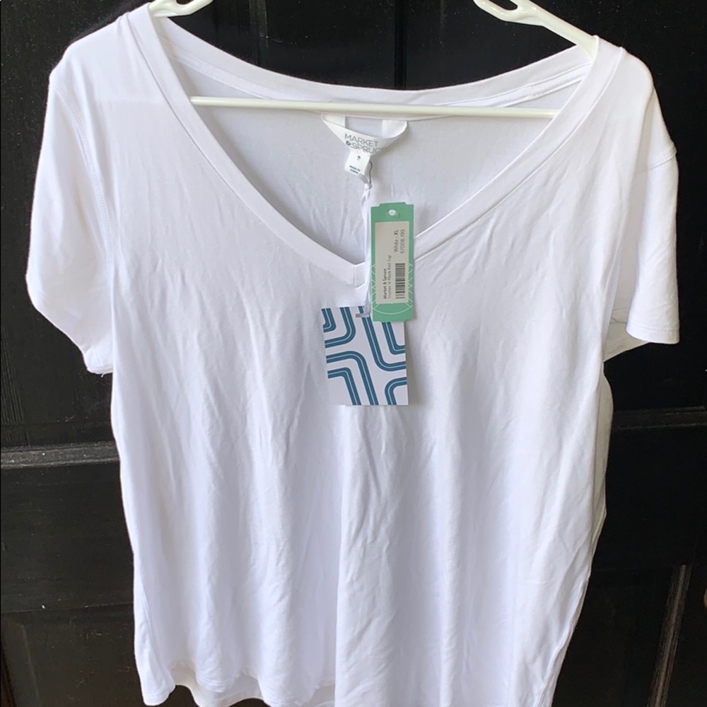 White tee with tags